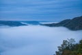 Fog rising on the mountains of the small Saar loop Royalty Free Stock Photo