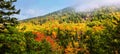 Fog rolling over the fall colors on Acadia National Park Royalty Free Stock Photo