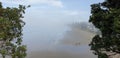 Fog rolling over Orewa Beach, Auckland Royalty Free Stock Photo