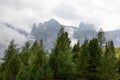Fog after summer rain in the Alpine mountains near town Colfosco Calfosch Italian Dolomites Royalty Free Stock Photo