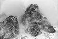 Fog in top of the rocky peaks