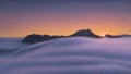 Fog in the valley at misty morning with view of Anboto mountain