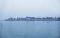 Fog view of San Michele island in Venice Royalty Free Stock Photo