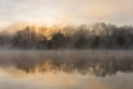 Fog on the water of Lake Lanier in Georgia, USA in winter at sunrise Royalty Free Stock Photo