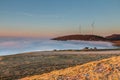 Fog, windmills and horses! Royalty Free Stock Photo