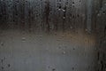 Fog and raindrops on window glass, dark background and lantern l Royalty Free Stock Photo
