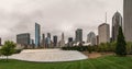 A foggy afternoon in the city of Chicago. Skyscrapers are hidden in the fog clouds. Panorama Royalty Free Stock Photo