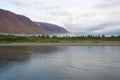 Foggy August morning on the river Sob. Polar Ural, Russia