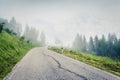 Foggy autumn scene of Caucasus mountain. Fantastic morning view of Upper Svaneti with asphalt road, Mestia location, Georgia,