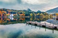 Foggy autumn view of Grundlsee lake. Wonderful morning scene of Brauhof village, Styria stare of Austria, Europe. Colorful view of