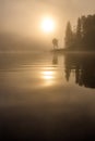 Foggy autumnal morning by the lake. Natural sunrise light. Trondheim area in Norway Royalty Free Stock Photo