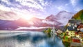 Foggy autumnal sunrise at famous Hallstatt lakeside town reflect