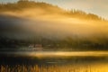 Foggy autumnal surise at Jonsvatnet, Norway Royalty Free Stock Photo