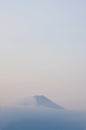 Foggy blurry distant mountains at evening dusk