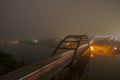 Foggy bridge at night