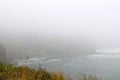 A foggy cloudy morning on the Pacific coast. Royalty Free Stock Photo