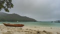 A foggy day on a tropical beach. Royalty Free Stock Photo