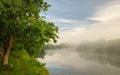 Foggy early morning.river bank Royalty Free Stock Photo