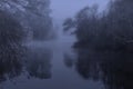 Foggy forest river at night Royalty Free Stock Photo