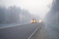 Foggy frosty morning on the route Royalty Free Stock Photo