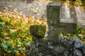 Foggy Graveyard at night. Old Spooky cemetery in moonlight through the trees Royalty Free Stock Photo