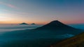 Foggy and hazy Golden sunrise behind mountain Royalty Free Stock Photo