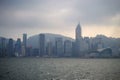 Foggy Hong Kong on Victoria`s harbour from Tsim Sha Tsui waterfront