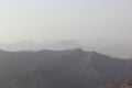 Foggy Jabal Jais mountain and desert landscape near Ras al Khaimah, UAE