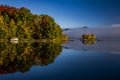 Foggy Lake and Green Mountains - Island with Colorful Trees - Autumn / Fall - Vermont Royalty Free Stock Photo