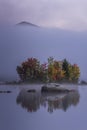 Foggy Lake and Green Mountains - Island with Colorful Trees - Autumn / Fall - Vermont Royalty Free Stock Photo