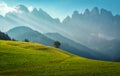 Foggy landscape in the Dolomites mountains. Mountain valley during sunrise. Natural summer landscape. Wonderful nature countryside Royalty Free Stock Photo