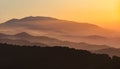 Foggy landscape of mountains layers. Misty mountains with fog