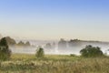 Foggy meadow at sunrise on Podlasie, Poland Royalty Free Stock Photo