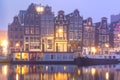 Amsterdam canal Amstel with dutch houses Royalty Free Stock Photo