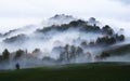 Foggy morning on the hill in the Italian countryside. Autumn landscape. Royalty Free Stock Photo