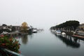 Foggy morning on Lake Garda, Peschiera del Garda, Italy Royalty Free Stock Photo