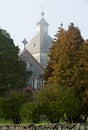 A foggy morning in an old churchyard in late summer Royalty Free Stock Photo