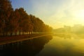 Foggy morning over the lake, fall trees reflected in water Royalty Free Stock Photo