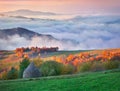 Foggy morning scene in the mountain village Royalty Free Stock Photo