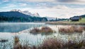 Foggy morning scene of Wagenbruchsee Geroldsee lake with Zugspitze mountain range on background. Beautiful autumn view of Royalty Free Stock Photo
