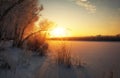 Foggy morning sunrise. Colorful evening, bright sunshine over a river or lake.