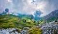 Foggy morning view of Cinque Torri mountain range. Majestic summer scene of Dolomiti Alps, Cortina d`Ampezzo, Province of Belluno Royalty Free Stock Photo