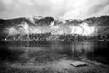 Black and white lake landscape with mountains. Cloudy and foggy view, abstract nature panorama Royalty Free Stock Photo