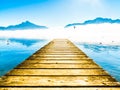 Foggy mountain landscape on Pier of lake Mondsee in Austria Royalty Free Stock Photo