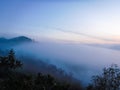 Foggy mountain before sunrise