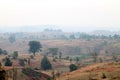 Foggy mountain valley at sunrise in the village in Nasik, Maharashtra, India Royalty Free Stock Photo