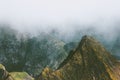 Foggy Mountains peak Landscape aerial view from Hermannsdalstinden summit in Norway