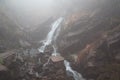 Foggy mystery waterfall