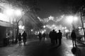 People walking on the streets of Foggia decorated with christmas lights. Royalty Free Stock Photo