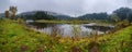 Foggy and overcast autumn day in Carpathian Mountains. Rika river bend, Transcarpathia, Ukraine Royalty Free Stock Photo